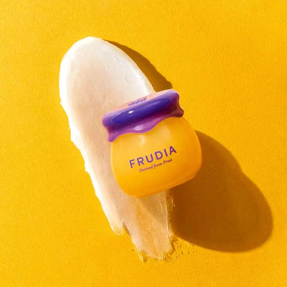 Mitrinošs balzams lūpām ar mellenēm FRUDIA Blueberry Hydrating Honey Lip Balm