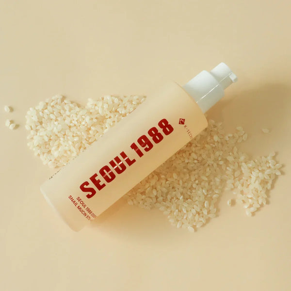 Mitrinošā esence K-Secret Seoul 1988 Essence Snail Mucin 97% + Rice
