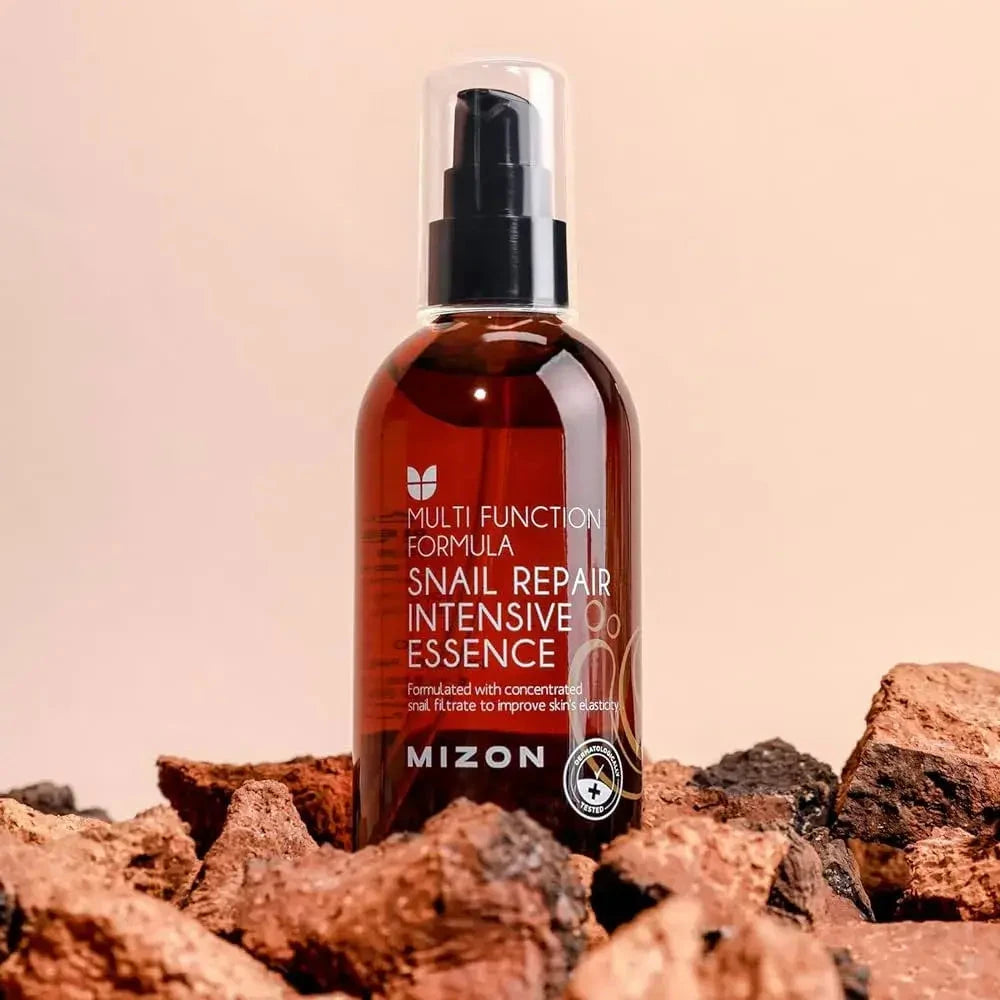 Atjaunojoša esence ar gliemežu mucīnu Mizon Snail Repair Intensive Essence